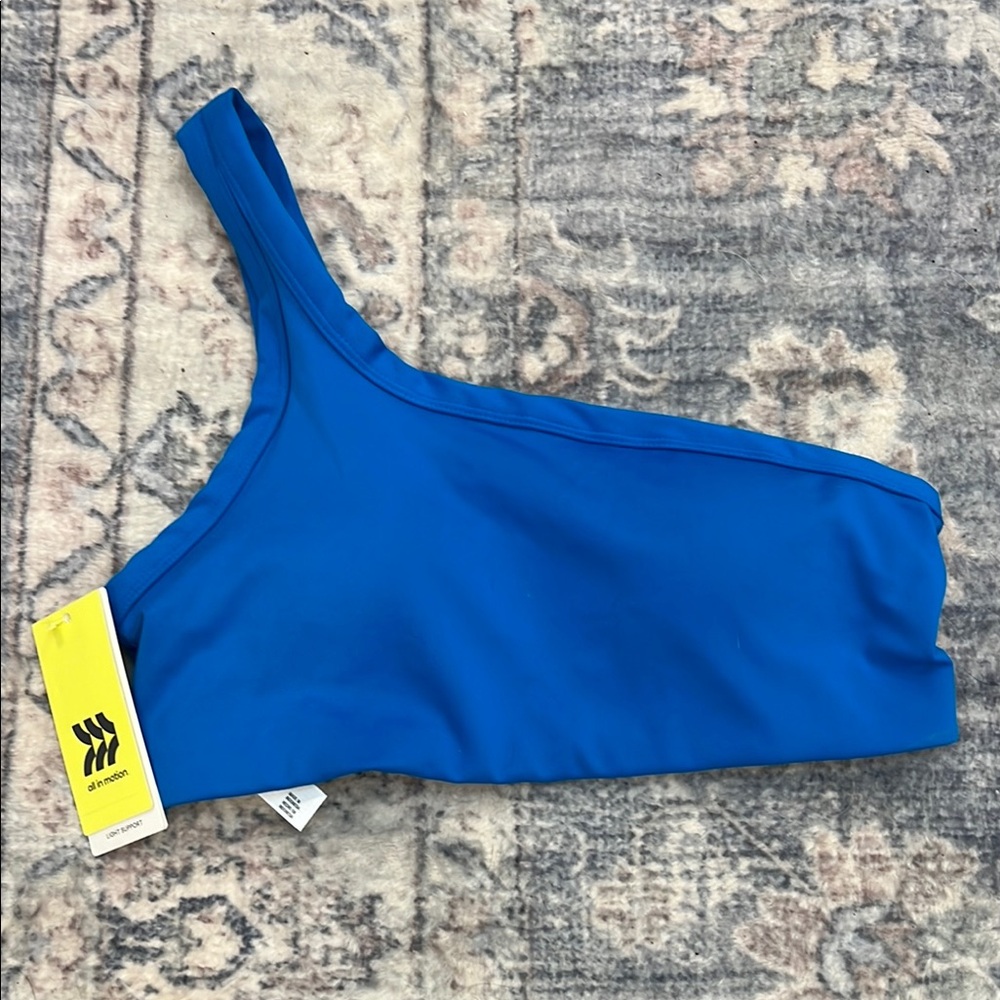 All In Motion Blue Asymmetrical sports bra size small. NWT! - Picture 1 of 7